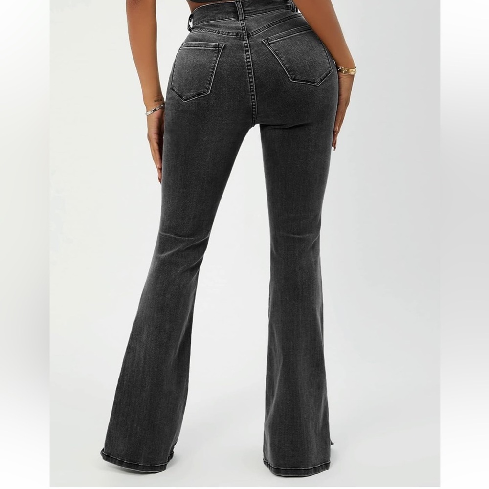 Stylish dark grey flare denim jeans featuring a slit on each leg